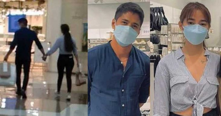 Aljur Abrenica and AJ Raval holding hands while walking inside a mall